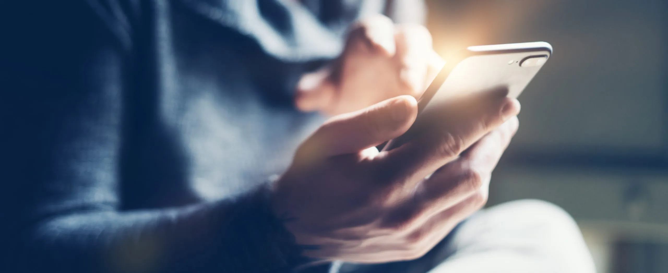 Business Man Looking at a Mobile-Friendly Website