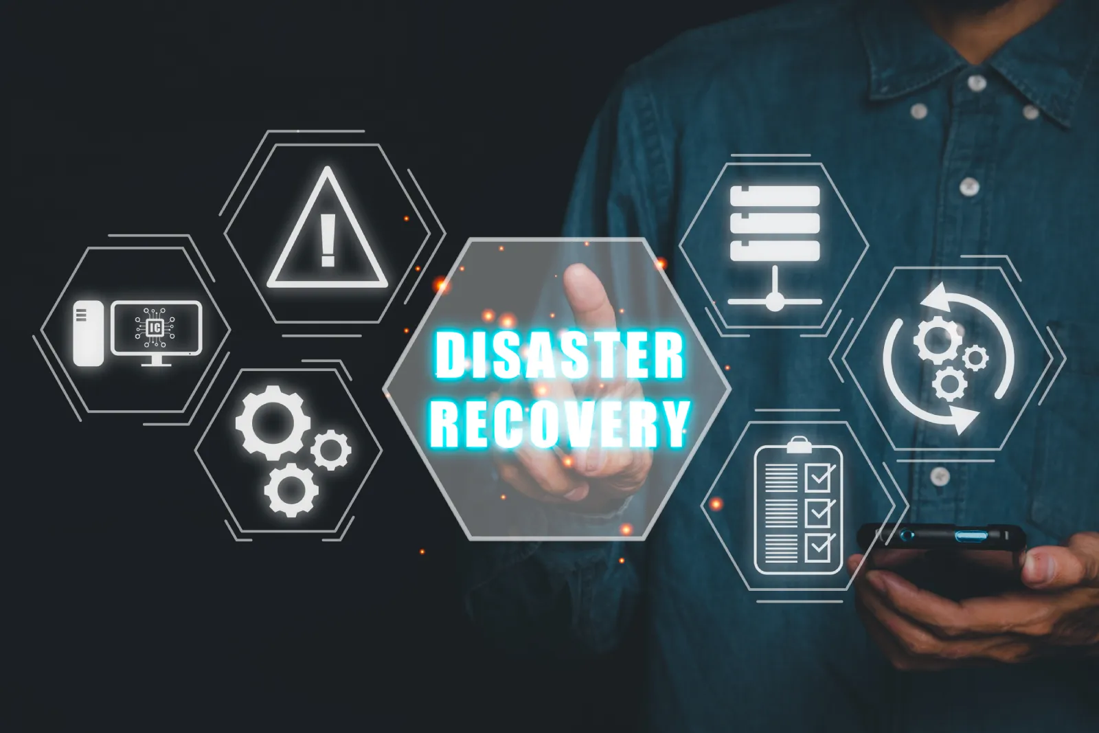 IT professional accessing a remote work IT infrastructure disaster recovery plan with system and data backup icons
