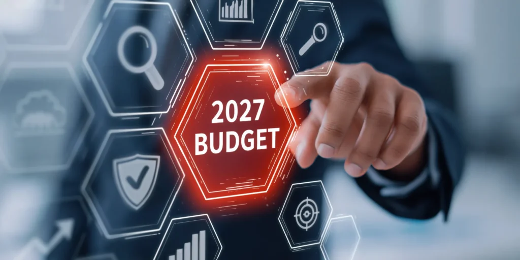 Businessman selecting 2027 budget on IT budget planning interface